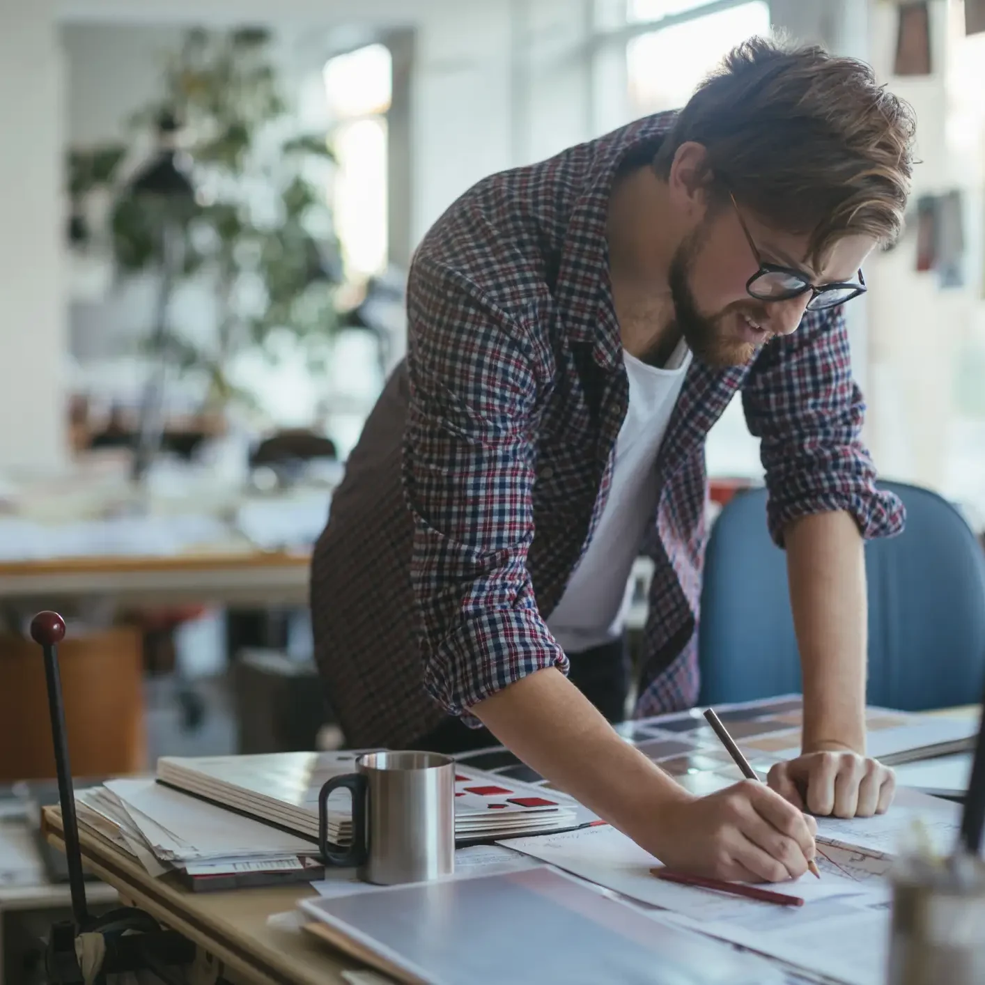 Close up of a male architect working on a project