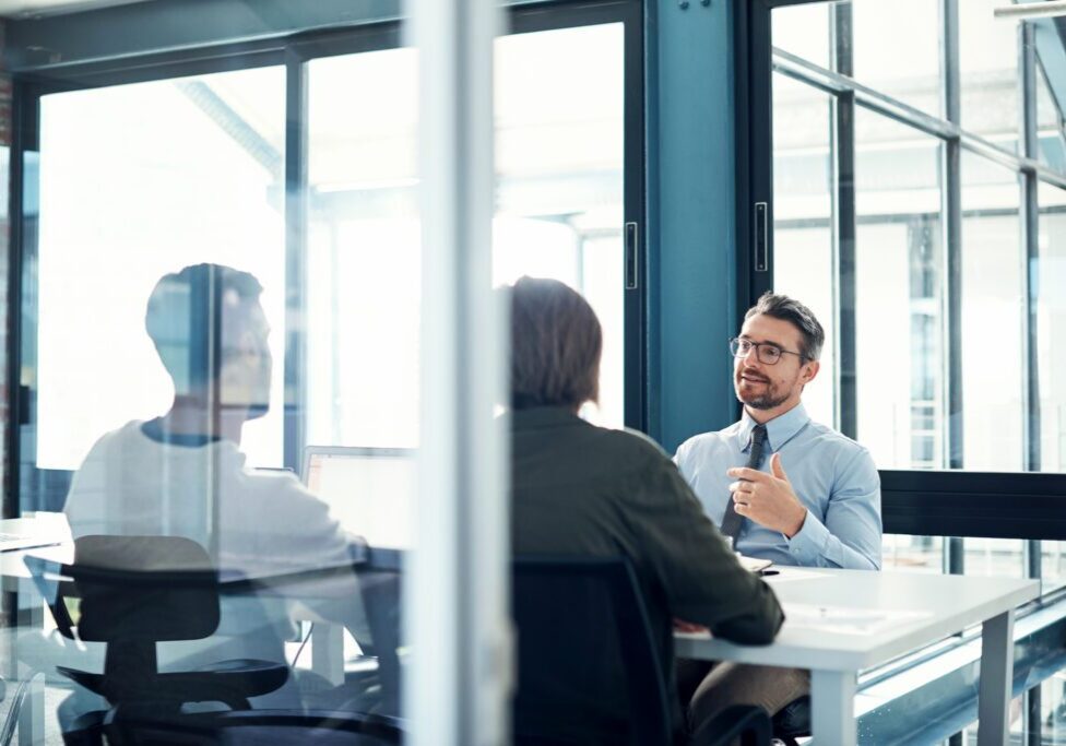 Shot of a group of businesspeople having a meeting in a modern office